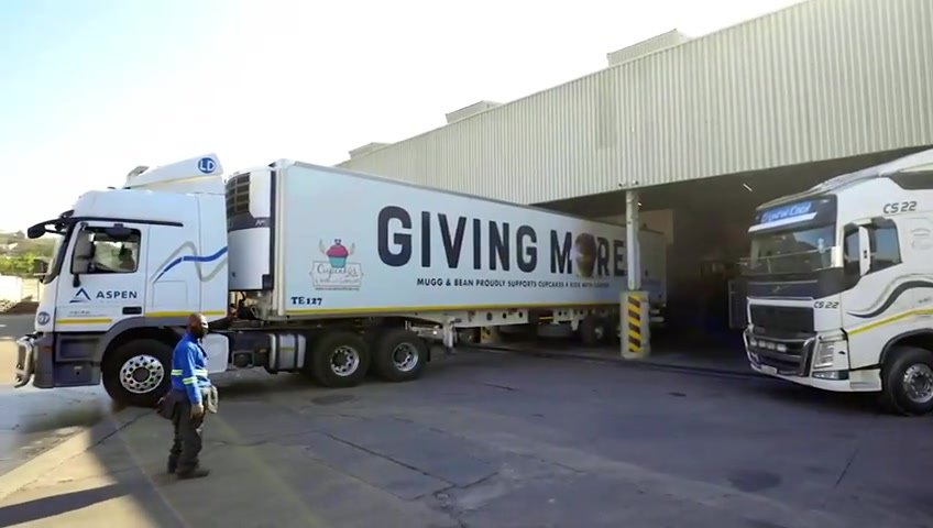 Cold-chain trucks at a loading area